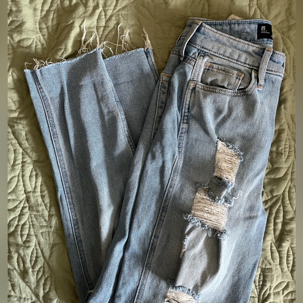 Distressed Light Blue Jeans